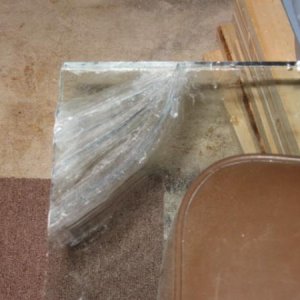 Broke the corner of the other side... repaired with silicone.