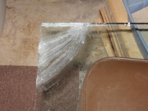 Broke the corner of the other side... repaired with silicone.